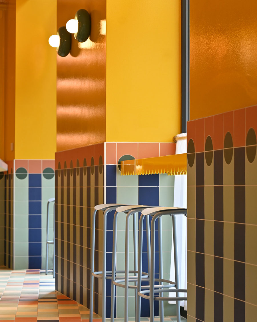 Detail of geometric ceramic finishes and colourful interior surfaces at Da Nonna restaurant
