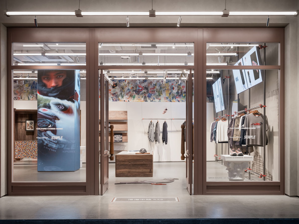 STAPLE Shanghai flagship store faรงade with perforated red metal cladding and oversized pigeon symbol