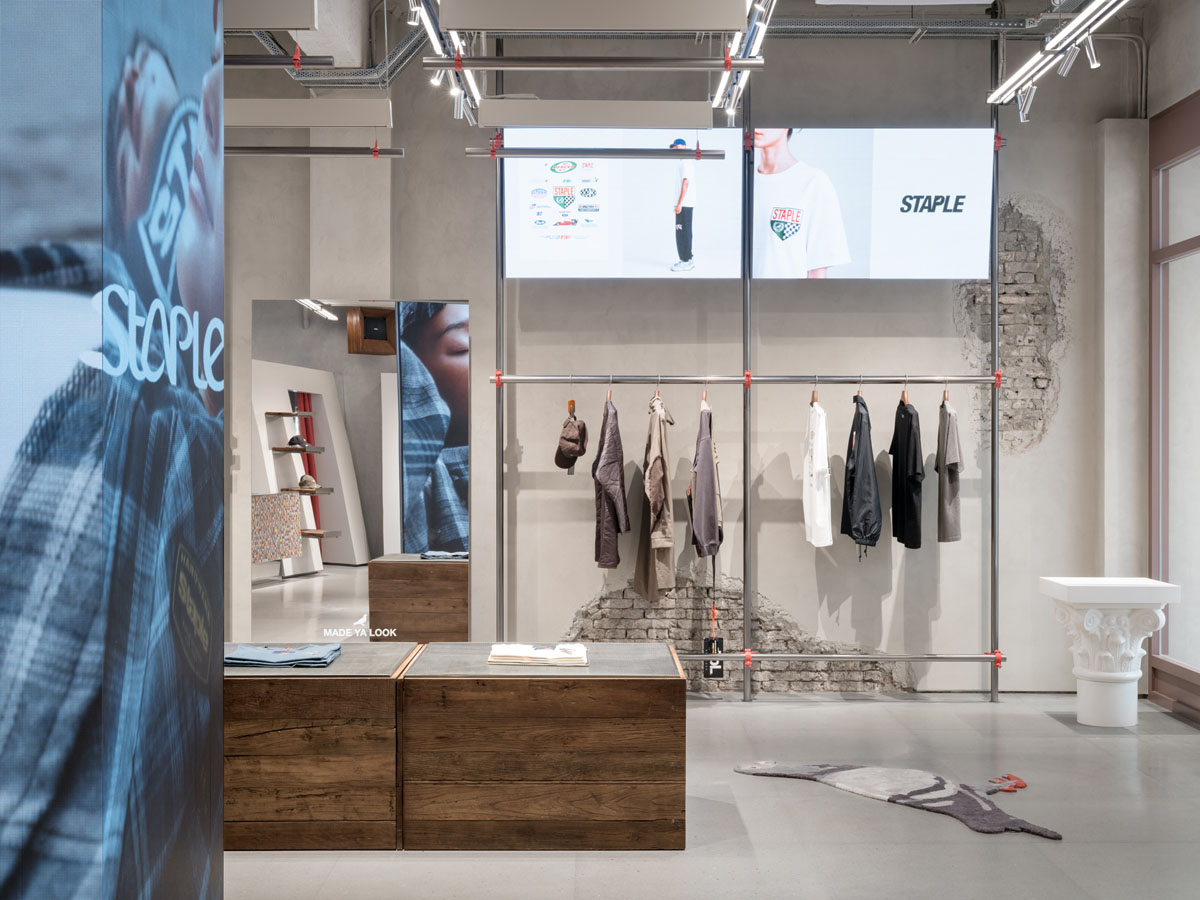 interior of the STAPLE Shanghai flagship store with modular merchandising systems