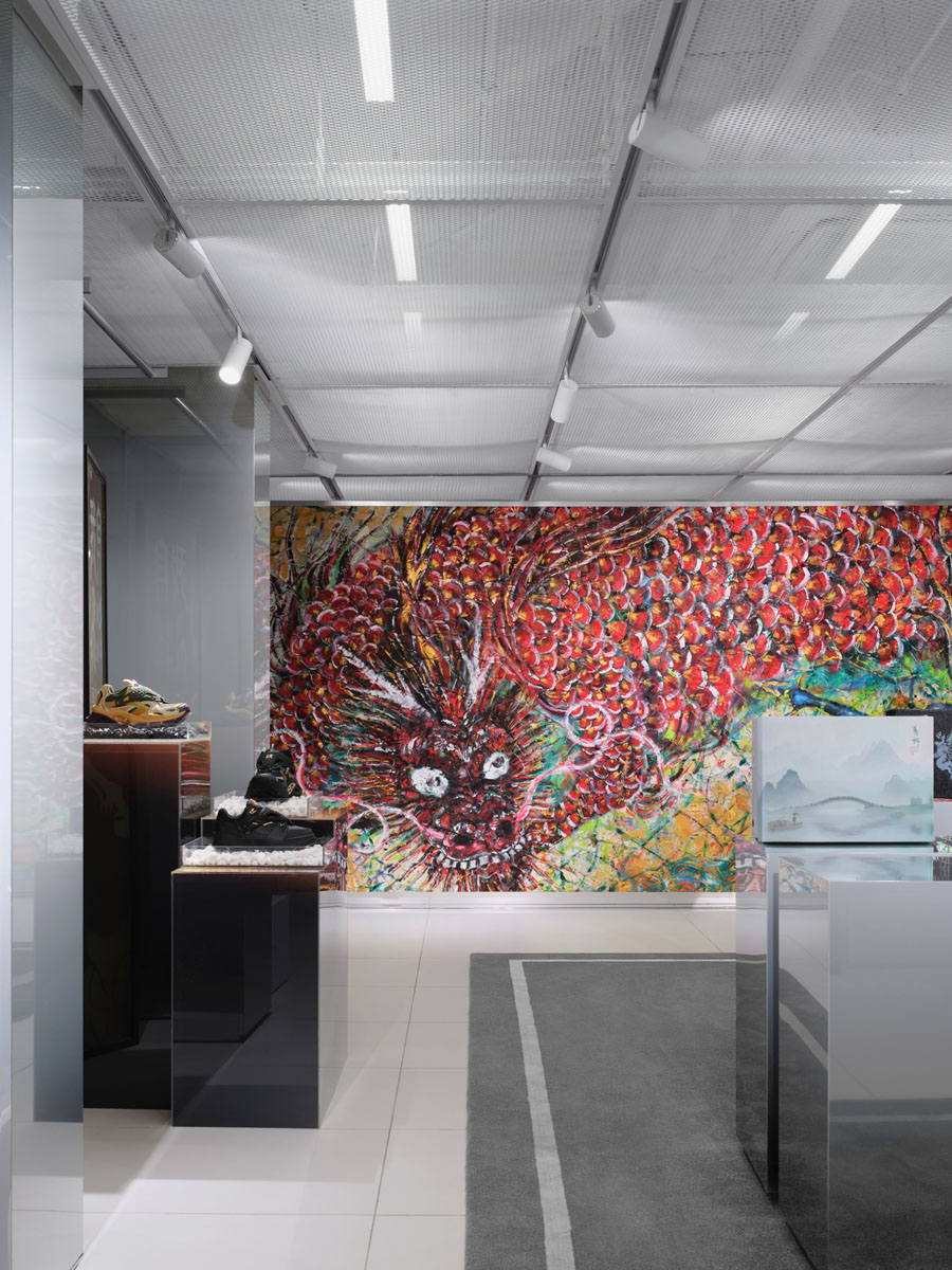 Retail space with apparel displays and digital screen inside the Warrior 1927 flagship store in Shanghai