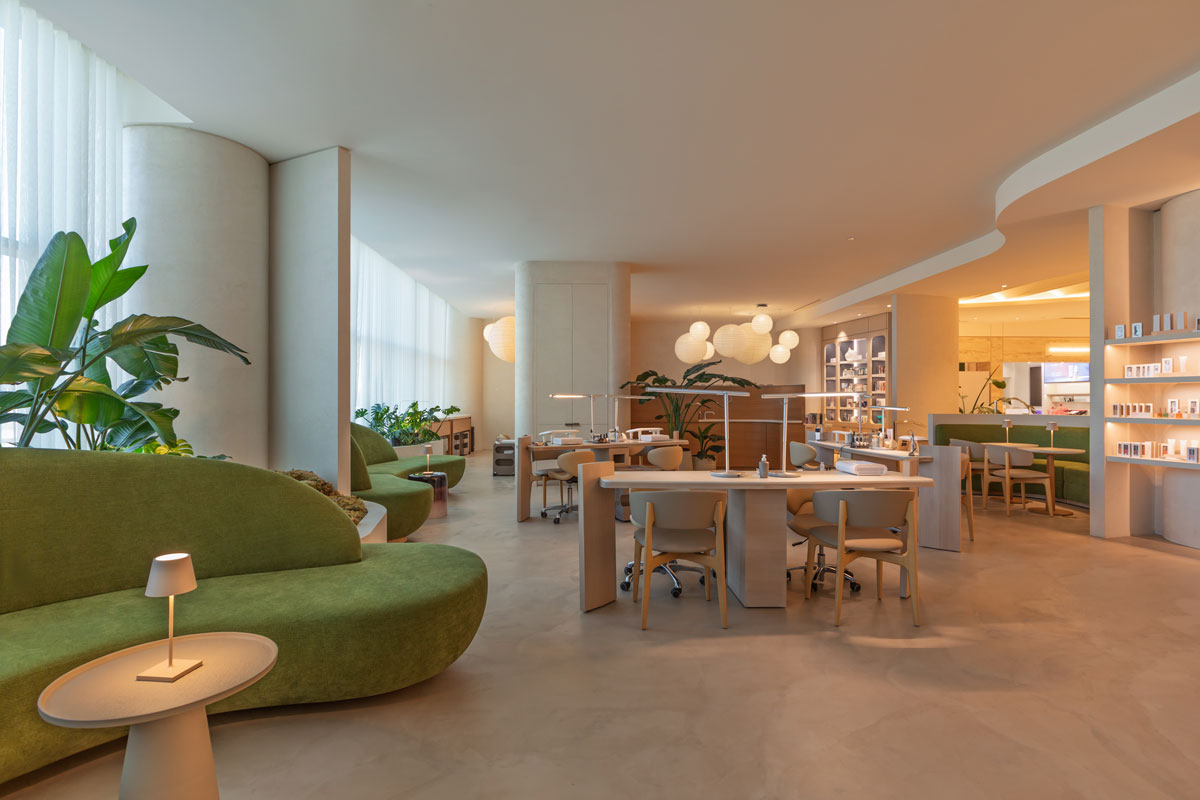 Beauty services area at Rennaï Beauty Hall featuring lounge seating, consultation stations and a hospitality-inspired atmosphere