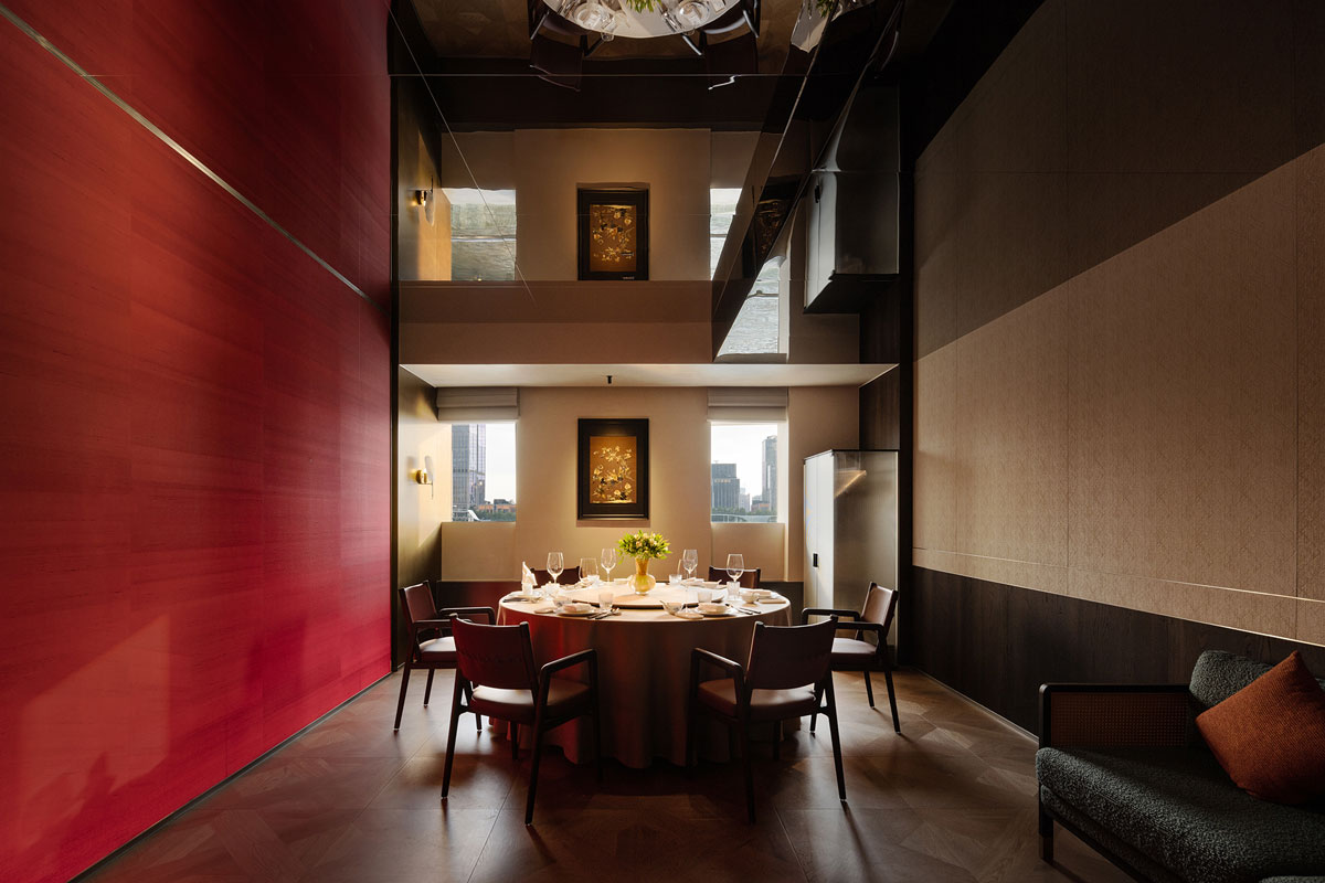 Reception area with illuminated shelving, wine display and Sichuan culinary ingredients