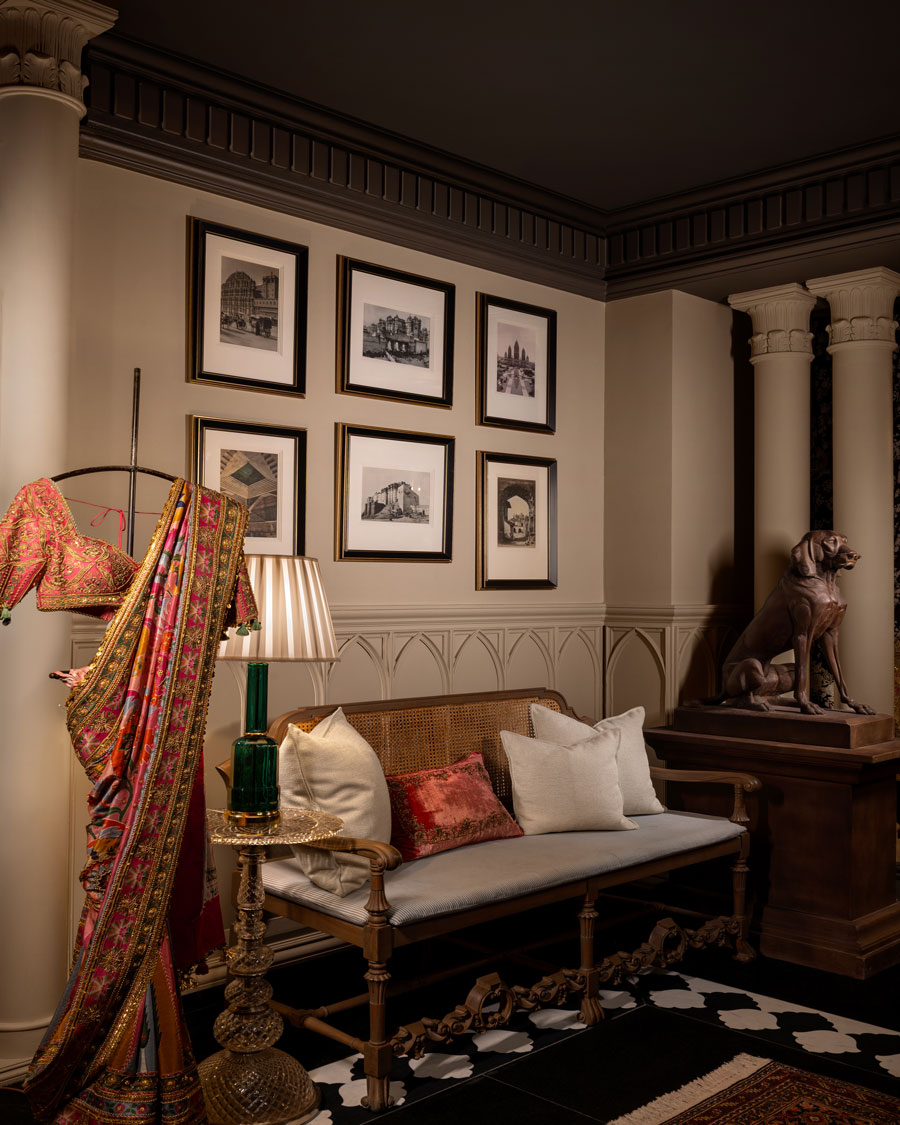 Gazal Gupta flagship interior with couture garments, scenic lighting and handcrafted architectural details.
