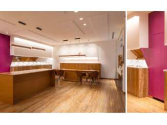 Interno del negozio Ottica Adami dopo il restyling: arredi recuperati, layout contemporaneo e porta porpora come elemento identitario.
