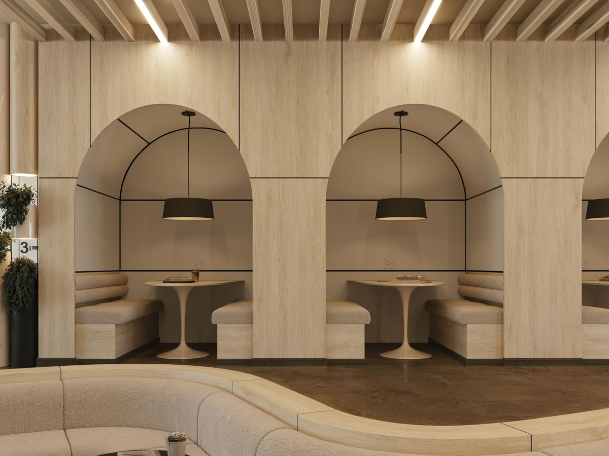 Lounge area with oak-effect Tafisa ICONIQ surfaces, arched alcoves and integrated seating