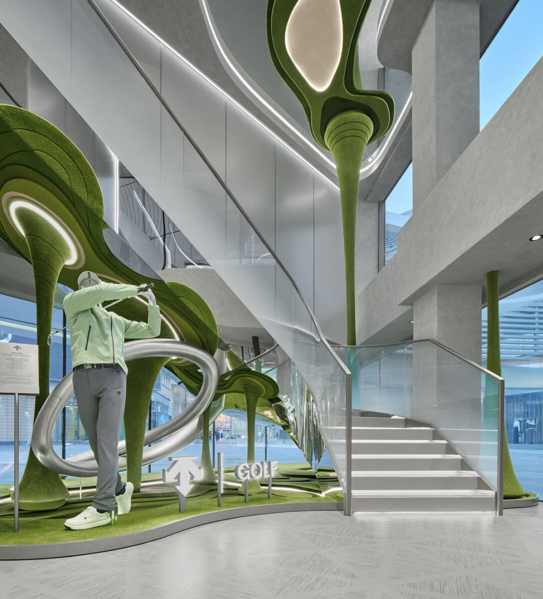 DESCENTE golf area in Beijing with green installation and internal staircase