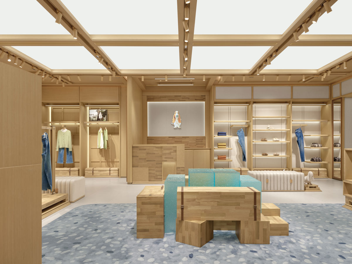 Hush Puppies flagship store in Shanghai designed by STILL YOUNG with light-toned wood interiors and modular displays