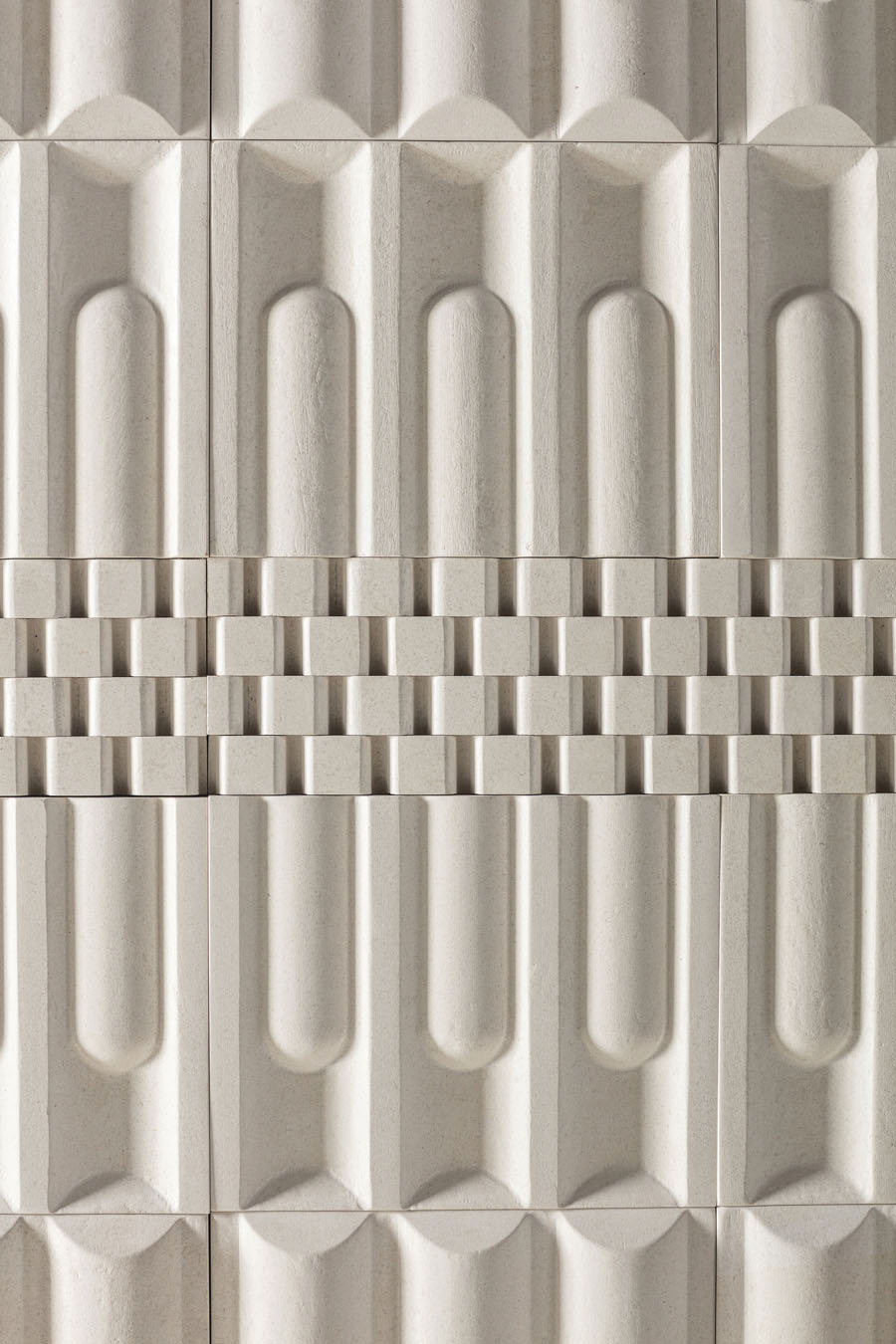 Detail of the sculpted modular reliefs of Lithea Jadeela collection