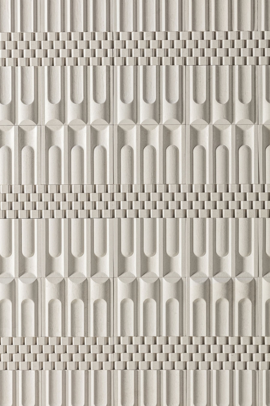 Lithea Jadeela three-dimensional stone cladding with sculpted modular reliefs