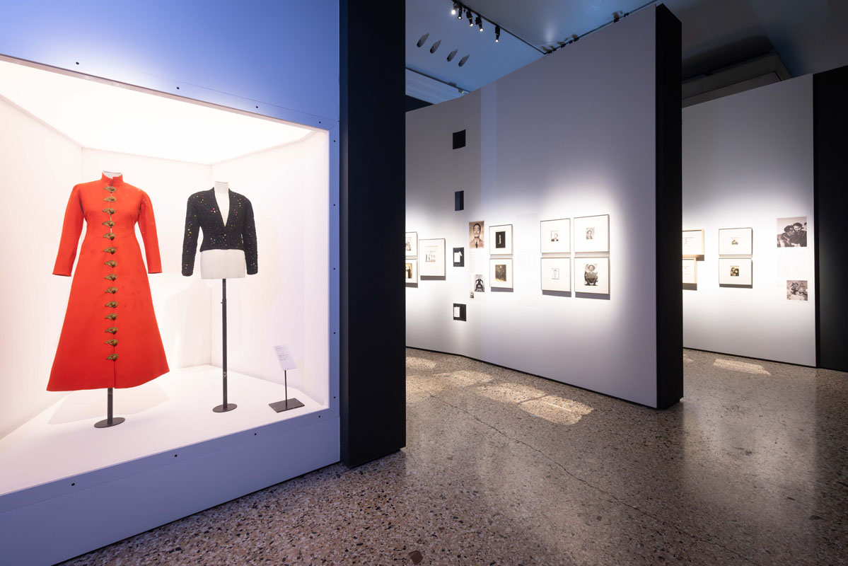 Dalí and Fashion exhibition design with light and dark backdrops