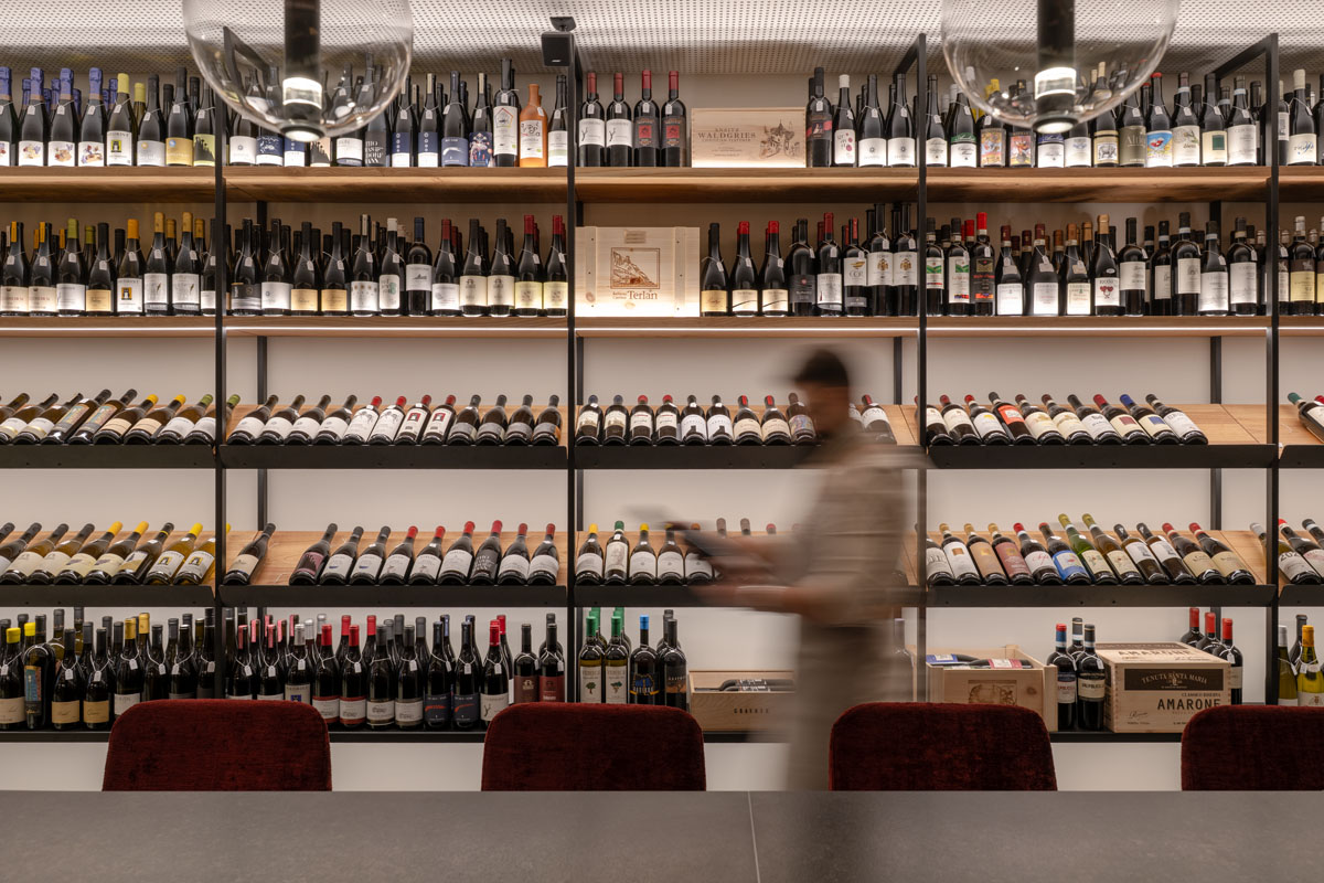 Interior of Enoteca da Aldo in Bolzano with wine display systems