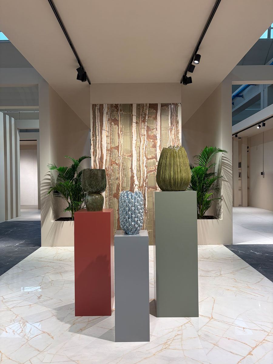 Interior setting with ceramic surfaces and decorative objects at the ABK Group Studio showroom