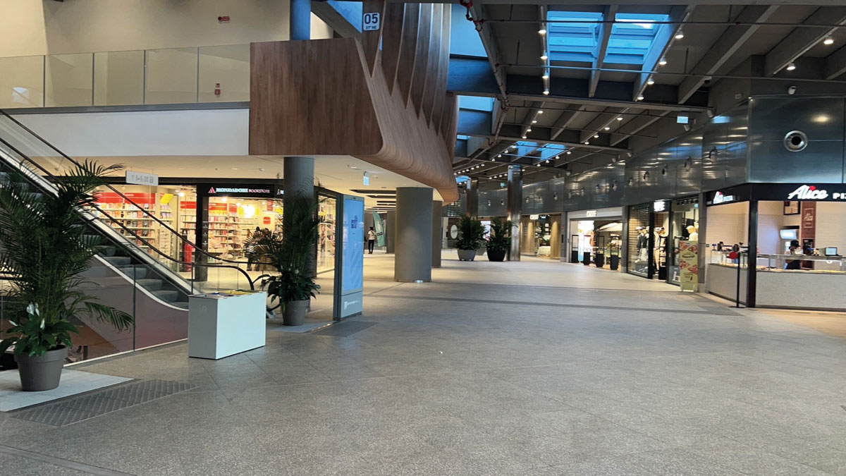 Interior of Waterfront Mall in Genoa with stores and circulation areas