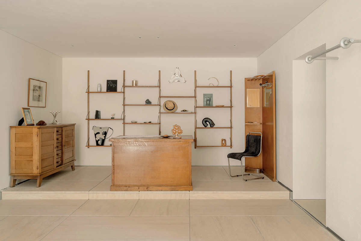 YOUWEI Xinle Road interior with curved wood wall and integrated display system