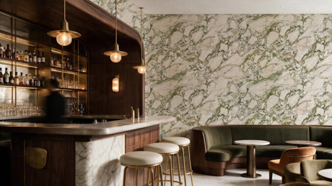 Terra Forma by Hovia marble-effect wallpaper in a hospitality interior